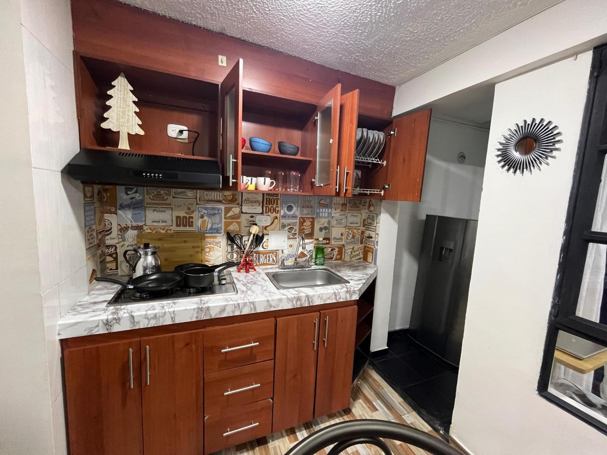 Apartamento Apartasuites 53 Cerca Al Aeropuerto 02
