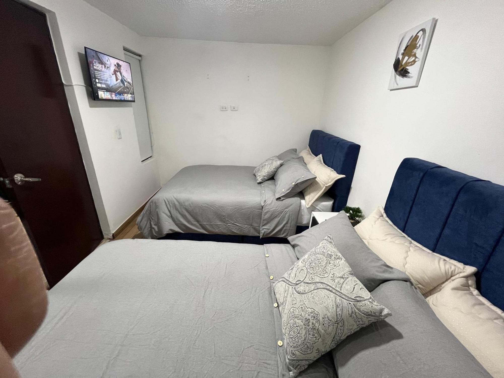 Apartamento Apartasuites 53 Cerca Al Aeropuerto 02